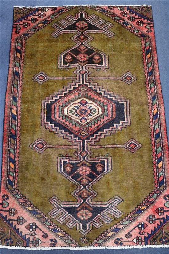 A Hamadan mustard ground rug, 4ft 7in by 2ft 11in.